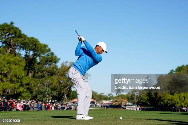 Tiger Woods plays his shot from the 12th tee during the second round of the Valspar Championship at Innisbrook Resort Copperhead Course on March 9,...