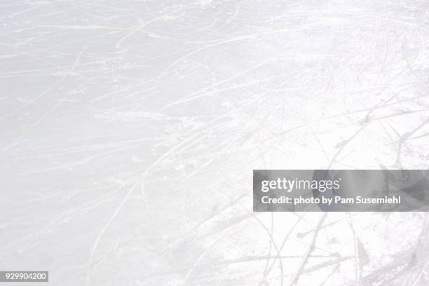 blade marks on outdoor rink ice - ice skating rink stock pictures, royalty-free photos & images