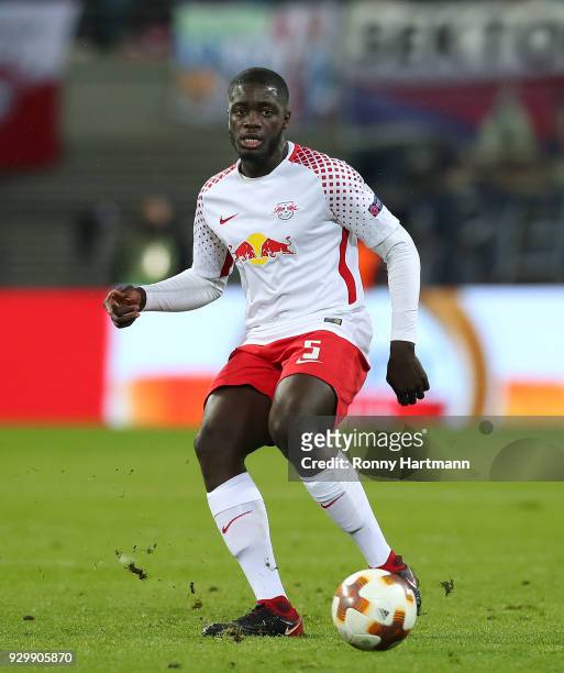 Dayot Upamecano of RB Leipzig runs with the ball during the UEFA Europa League Round of 16 match between RB Leipzig and Zenit St Petersburg at the...