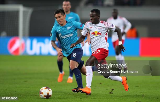Bruma of RB Leipzig and Matias Kranevitter of FC Zenit Saint Petersburg compete during the UEFA Europa League Round of 16 match between RB Leipzig...