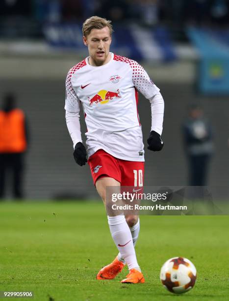 Emil Forsberg of RB Leipzig passes the ball during the UEFA Europa League Round of 16 match between RB Leipzig and Zenit St Petersburg at the Red...