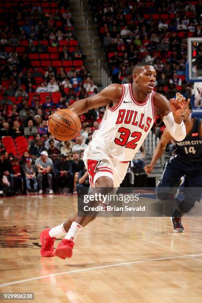 Kris Dunn of the Chicago Bulls handles the ball during the game against the Detroit Pistons on MARCH 9, 2018 at Little Caesars Arena in Detroit,...