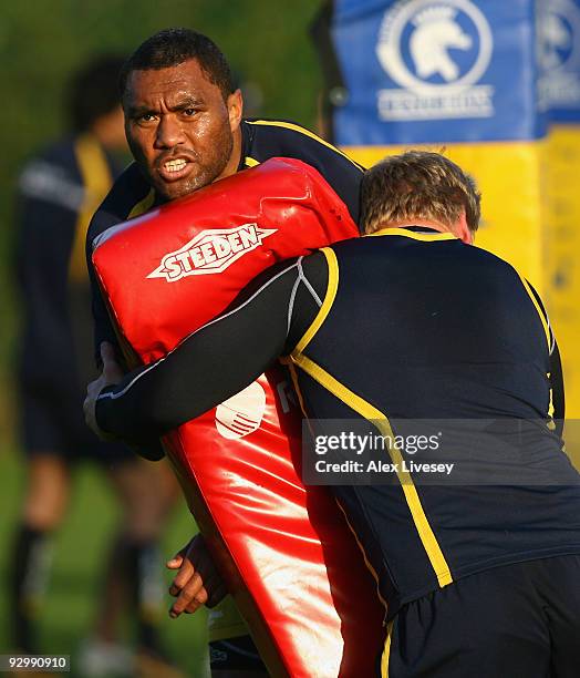 Petero Civoniceva of the VB Kangaroos Australian Rugby League team holds a tackle bag during the VB Kangaroos training session held at Leeds Academy...