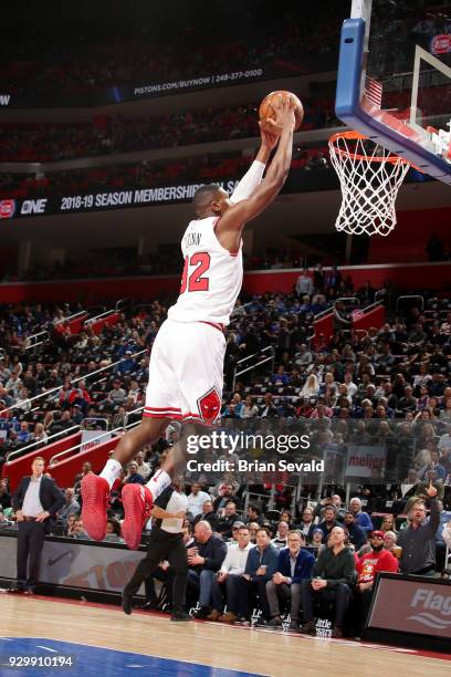 Kris Dunn of the Chicago Bulls dunks the ball during the game against the Detroit Pistons on MARCH 9, 2018 at Little Caesars Arena in Detroit,...