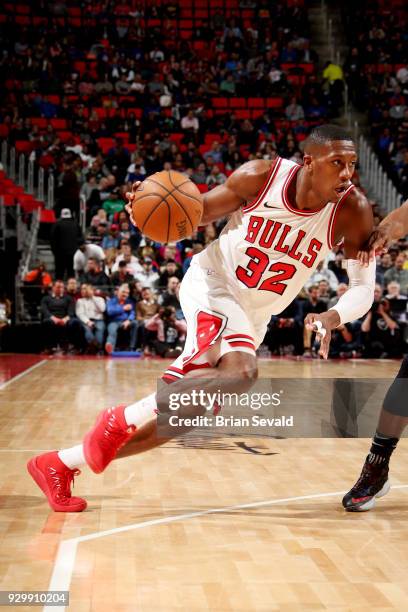 Kris Dunn of the Chicago Bulls handles the ball during the game against the Detroit Pistons on MARCH 9, 2018 at Little Caesars Arena in Detroit,...