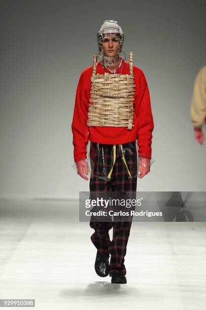 Model walks the catwalk during the Filipe Augusto show for the Sangue Novo show at the 50th edition of Lisboa Fashion Week 'ModaLisboa' AW 2018 at...