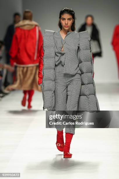 Model walks the catwalk during the Ines Nunes do Valle show for the Sangue Novo show at the 50th edition of Lisboa Fashion Week 'ModaLisboa' AW 2018...