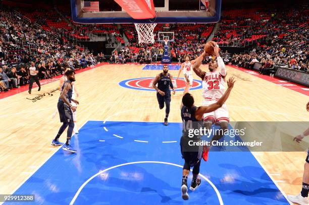 Kris Dunn of the Chicago Bulls shoots the ball against the Detroit Pistons on March 9, 2018 at Little Caesars Arena in Detroit, Michigan. NOTE TO...