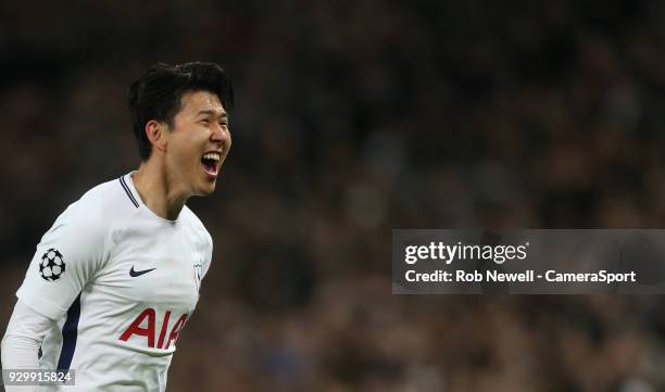 Tottenham Hotspur's Son Heung-Min celebrates scoring his side's first goal during the UEFA Champions League Round of 16 Second Leg match between...