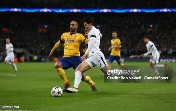 Tottenham Hotspur's Son Heung-Min and Medhi Benatia of Juventus during the UEFA Champions League Round of 16 Second Leg match between Tottenham...