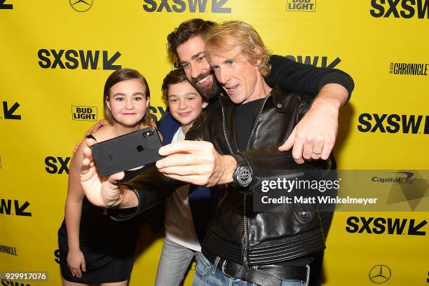 Millicent Simmonds, Noah Jupe, John Krasinski, and Michael Bay attend the "A Quiet Place" Premiere 2018 SXSW Conference and Festivals at Paramount...