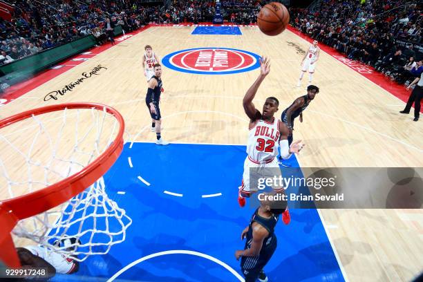 Kris Dunn of the Chicago Bulls shoots the ball during the game against the Detroit Pistons on MARCH 9, 2018 at Little Caesars Arena in Detroit,...