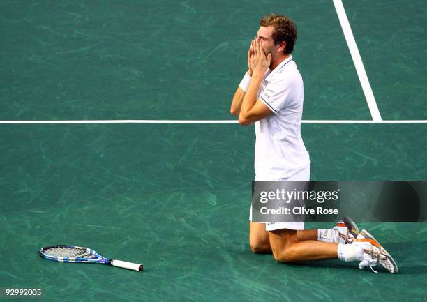 Julien Benneteau of France celebrates winning match point during his match against Roger Federer of Switzerland during the ATP Masters Series at the...