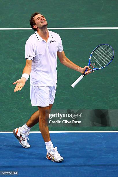 Julien Benneteau of France celebrates during his match against Roger Federer of Switzerland during the ATP Masters Series at the Palais Omnisports De...