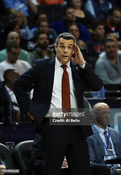 Head Coach Tony Bennett of the Virginia Cavaliers looks on against the Clemson Tigers during the semifinals of the ACC Men's Basketball Tournament at...