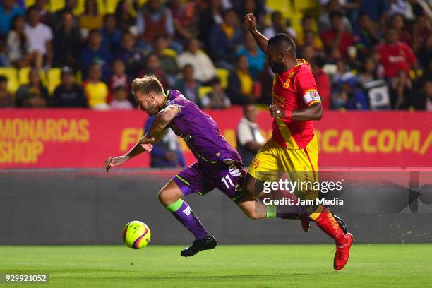 Cristian Menendez of Veracruz and Gabriel Achilier of Morelia fight for the ball during the 11th round match between Morelia and Veracruz as part of...