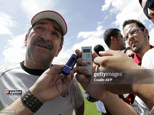 Costa Rican football team coach Brazilian Rene de Simoes talks to medias after a training session in the province of Alajuela, some 20 km west from...