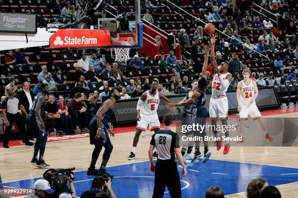 Kris Dunn of the Chicago Bulls shoots the ball during the game against the Detroit Pistons on MARCH 9, 2018 at Little Caesars Arena in Detroit,...