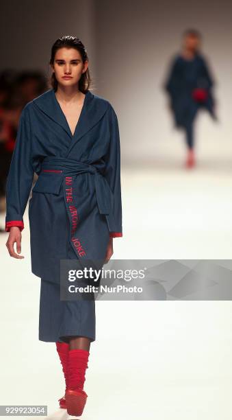 Model presents a Fall/Winter 2018-2019 collection creation by a Portuguese fashion design group Sangue Novo during the 50th edition of Moda Lisboa...