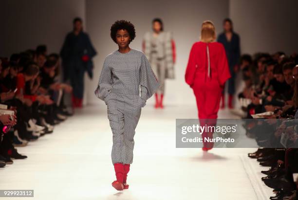 Model presents a Fall/Winter 2018-2019 collection creation by a Portuguese fashion design group Sangue Novo during the 50th edition of Moda Lisboa...