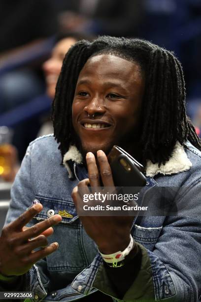 New Orleans Saints running back Alvin Kamara attends a NBA basketball game between the New Orleans Pelicans and the Washington Wizards during the...