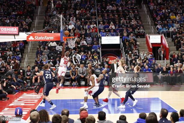 Kris Dunn of the Chicago Bulls shoots the ball during the game against the Detroit Pistons on MARCH 9, 2018 at Little Caesars Arena in Detroit,...