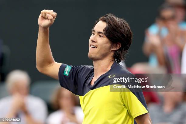 Taro Daniel of Japan celebrates his win over Cameron Noorie of Great Britain during the BNP Paribas Open at the Indian Wells Tennis Garden on March...