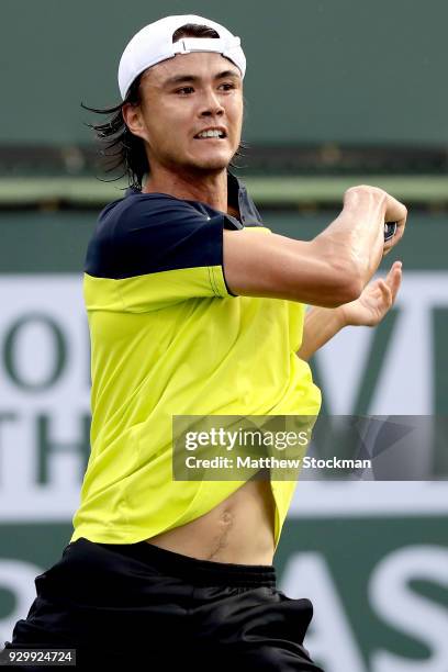 Taro Daniel of Japan plays Cameron Noorie of Great Britain during the BNP Paribas Open at the Indian Wells Tennis Garden on March 9, 2018 in Indian...