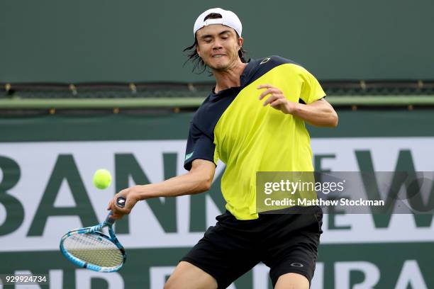 Taro Daniel of Japan plays Cameron Noorie of Great Britain during the BNP Paribas Open at the Indian Wells Tennis Garden on March 9, 2018 in Indian...