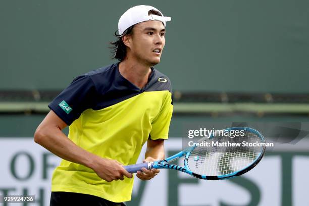Taro Daniel of Japan plays Cameron Noorie of Great Britain during the BNP Paribas Open at the Indian Wells Tennis Garden on March 9, 2018 in Indian...