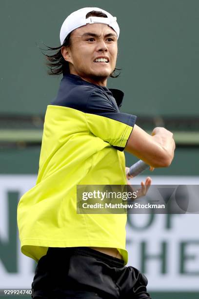 Taro Daniel of Japan plays Cameron Noorie of Great Britain during the BNP Paribas Open at the Indian Wells Tennis Garden on March 9, 2018 in Indian...