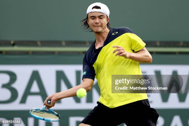 Taro Daniel of Japan plays Cameron Noorie of Great Britain during the BNP Paribas Open at the Indian Wells Tennis Garden on March 9, 2018 in Indian...