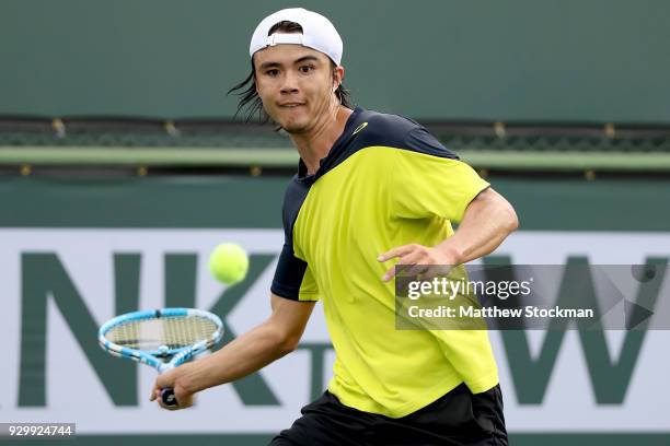 Taro Daniel of Japan plays Cameron Noorie of Great Britain during the BNP Paribas Open at the Indian Wells Tennis Garden on March 9, 2018 in Indian...