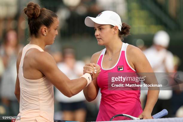 Maria Sakari of Greece is congratulated by Ashleigh Barty of Australia after their match during the BNP Paribas Open at the Indian Wells Tennis...