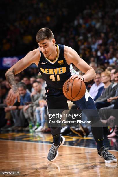 Juan Hernangomez of the Denver Nuggets handles the ball against the Los Angeles Lakers on March 9, 2018 at the Pepsi Center in Denver, Colorado. NOTE...