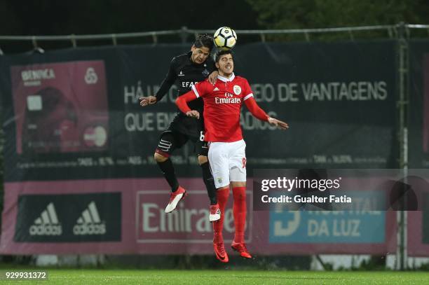 Benfica forward Anthony Carter from Australia with AA Coimbra defender Ze Castro from Portugal in action during the Segunda Liga match between SL...