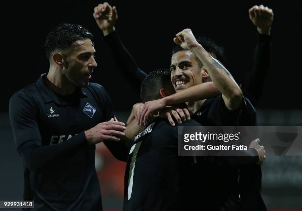 Coimbra forward Marinho from Portugal ccelebrates with teammates after scoring a goal during the Segunda Liga match between SL Benfica B and AA...