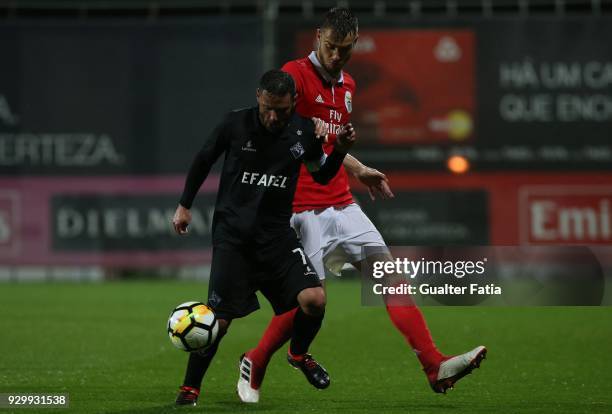 Coimbra forward Marinho from Portugal with SL Benfica defender Francisco Ferreira from Portugal in action during the Segunda Liga match between SL...