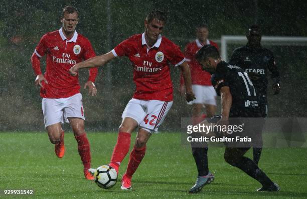 Benfica midfielder Martin Chrien from Slovakia with AA Coimbra defender Nelson Pedroso from Portugal in action during the Segunda Liga match between...