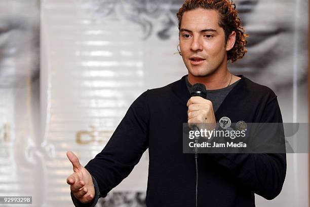 Spanish singer David Bisbal speaks during a press conference to present his new album 'Sin Mirar Atras' at Presidente Hotel on November 11, 2009 in...