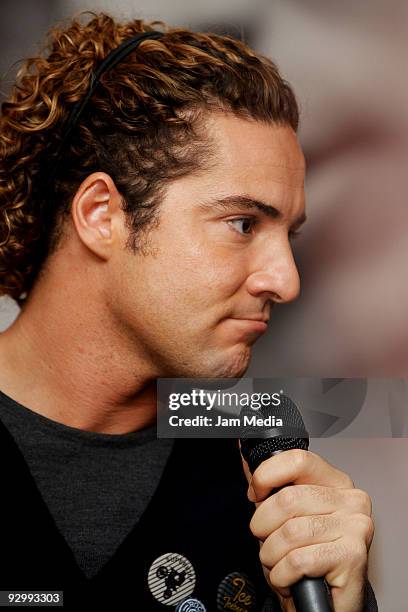 Spanish singer David Bisbal speaks during a press conference to present his new album 'Sin Mirar Atras' at Presidente Hotel on November 11, 2009 in...