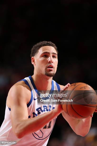 Klay Thompson of the Golden State Warriors shoots the ball against the Portland Trail Blazers on March 9, 2018 at the Moda Center in Portland,...