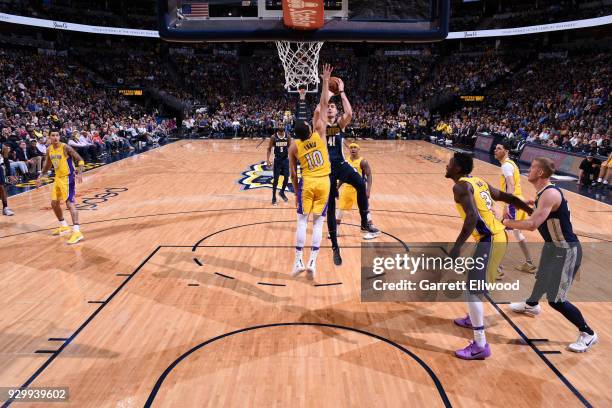 Juan Hernangomez of the Denver Nuggets shoots the ball against the Los Angeles Lakers on March 9, 2018 at the Pepsi Center in Denver, Colorado. NOTE...