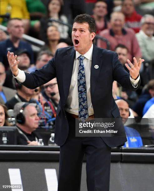 Head coach Steve Alford of the UCLA Bruins yells to his players during a semifinal game of the Pac-12 basketball tournament against the Arizona...