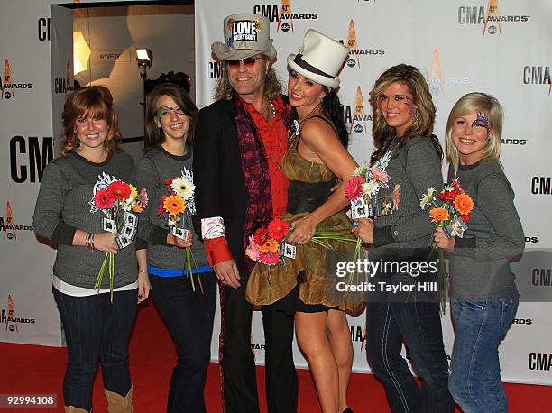Kenny Alphin of Big and Rich and Christiev Alphin with guests attend the 43rd Annual CMA Awards at the Sommet Center on November 11, 2009 in...