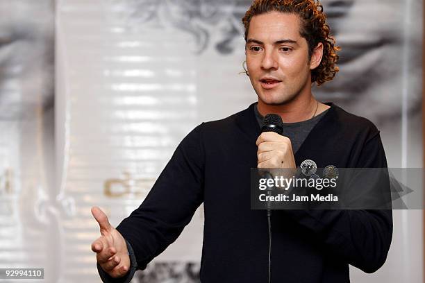 Spanish singer David Bisbal speaks during a press conference to present his new album 'Sin Mirar Atras' at Presidente Hotel on November 11, 2009 in...