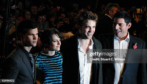 Actors Taylor Lautner, Kristen Stewart and Robert Pattinson and director Chris Weitz attend the 'Twillight Saga: New Moon' UK fan event at Battersea...