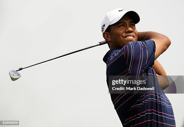 Tiger Woods of the USA tees off on the 8th hole during round one of the 2009 Australian Masters at Kingston Heath Golf Club on November 12, 2009 in...