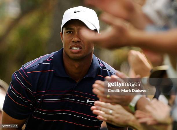 Tiger Woods of the USA tees off on the 6th hole during round one of the 2009 Australian Masters at Kingston Heath Golf Club on November 12, 2009 in...