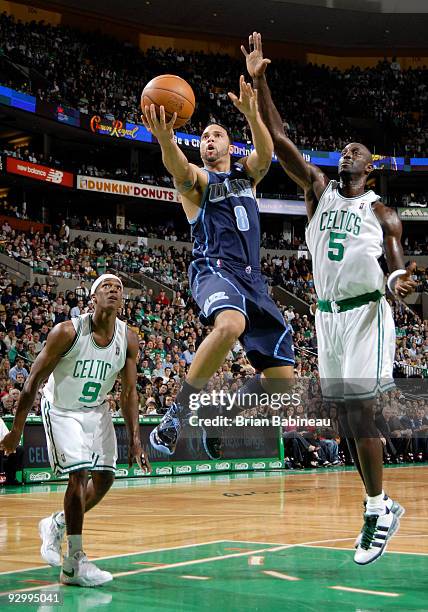 Deron Williams of the Utah Jazz drives the lane against Kevin Garnett of the Boston Celtics on November 11, 2009 at the TD Garden in Boston,...